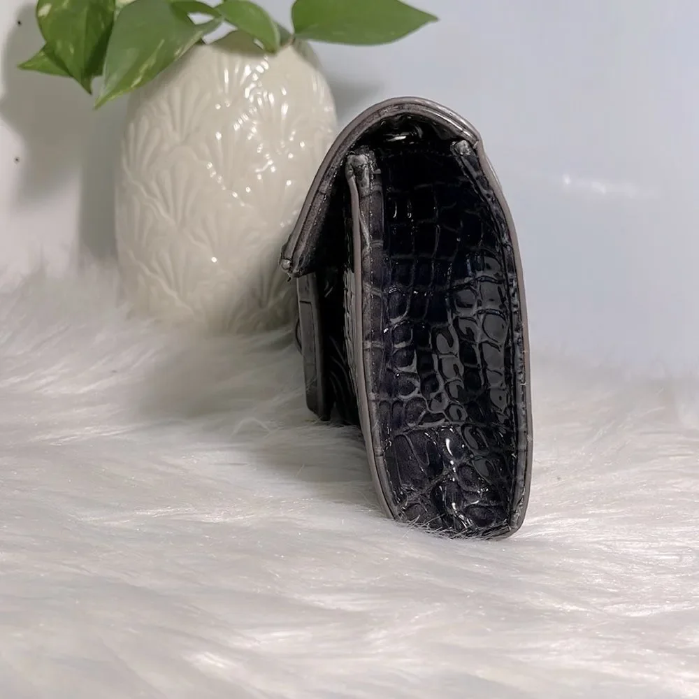 Squared by Sondra Roberts clutch bag.